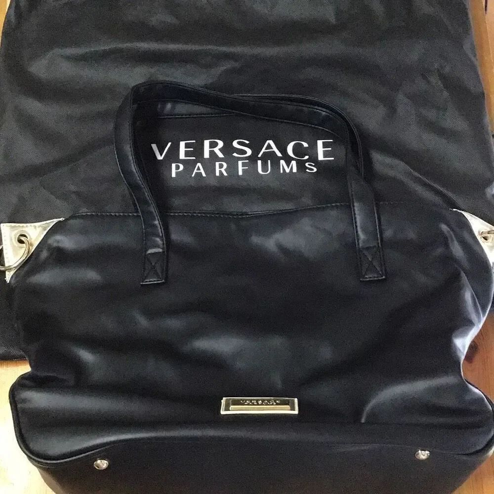 New Versace perfume, tote purse with accessories and dust bag